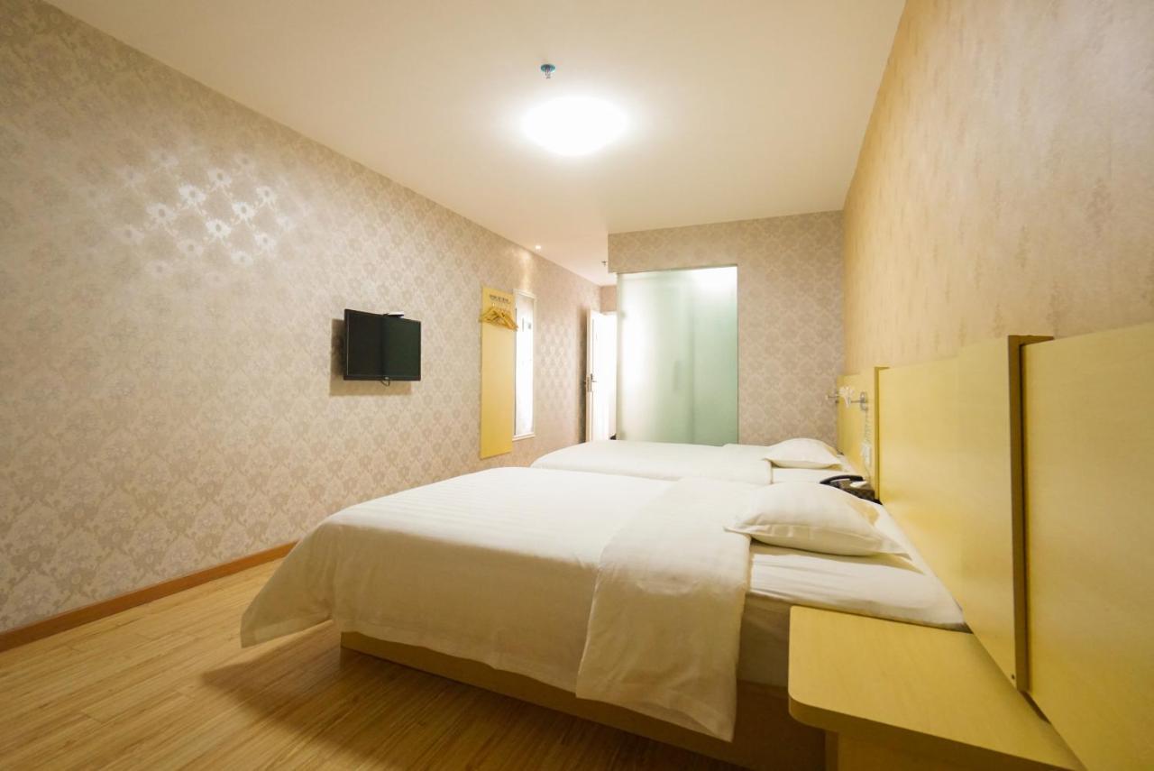 Jia Mei Xin Holiday Hotel Baiyun Airport Branch Гуанчжоу Экстерьер фото
