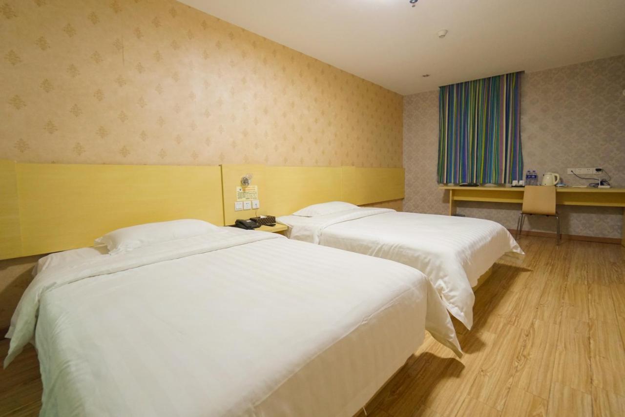 Jia Mei Xin Holiday Hotel Baiyun Airport Branch Гуанчжоу Экстерьер фото
